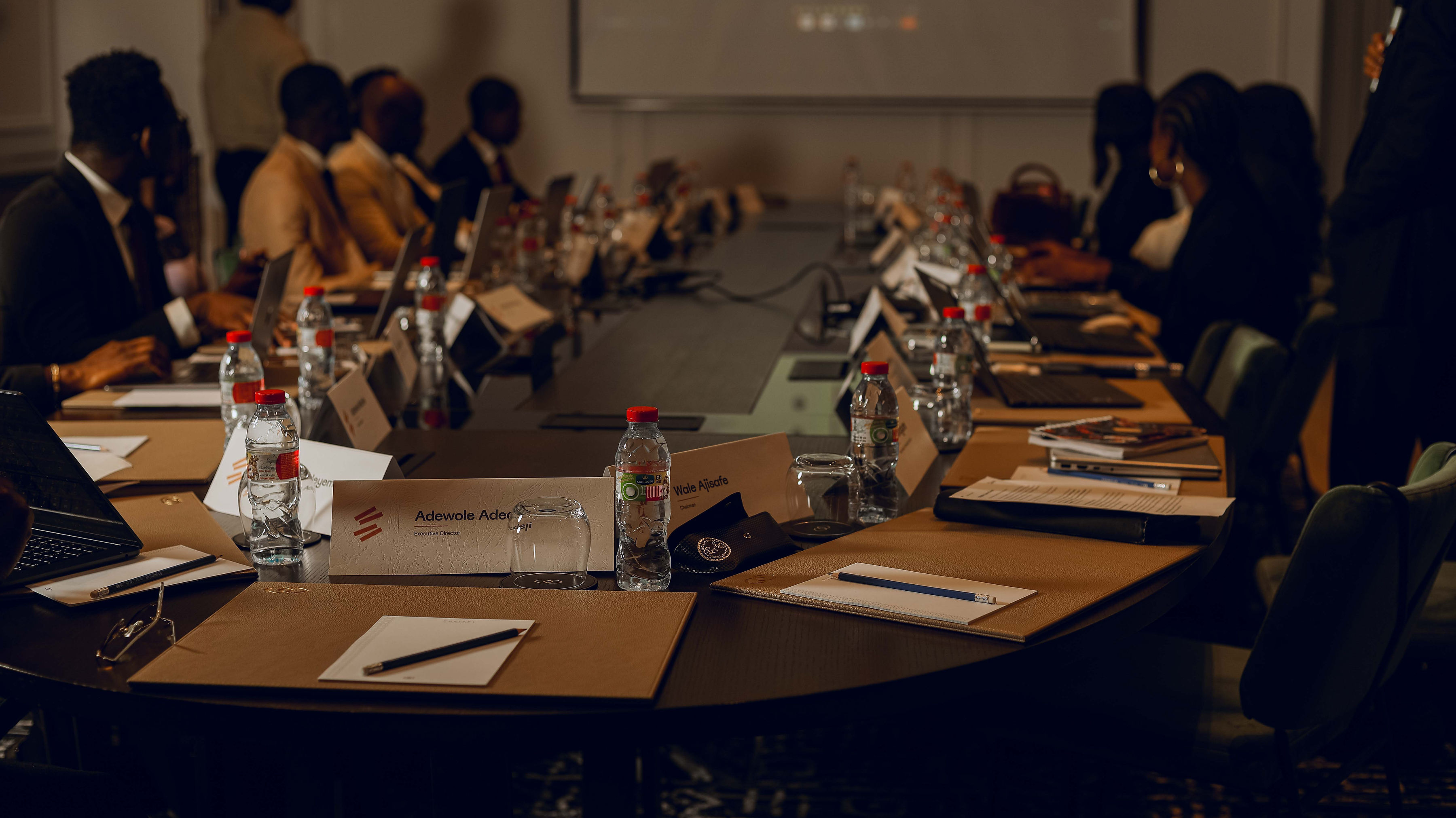 Starks leadership seated at the boardroom table